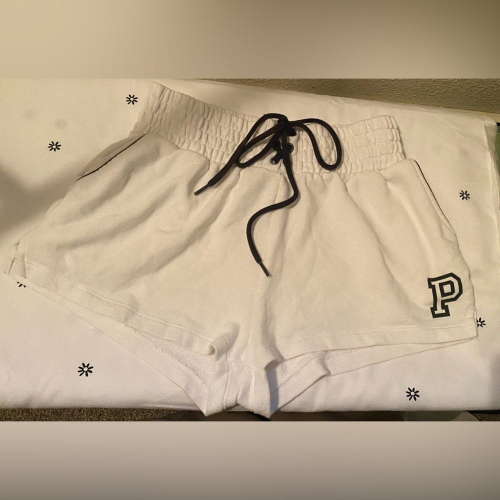 White lace up shorts. Small. Great condition